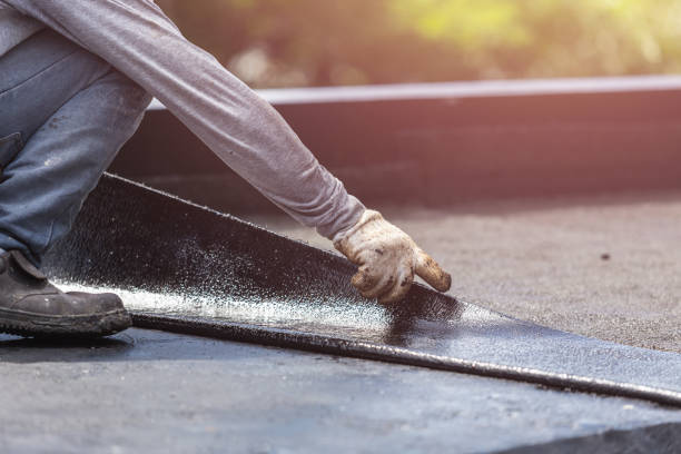 Professional Waterproofing technician working in Vienna, VA